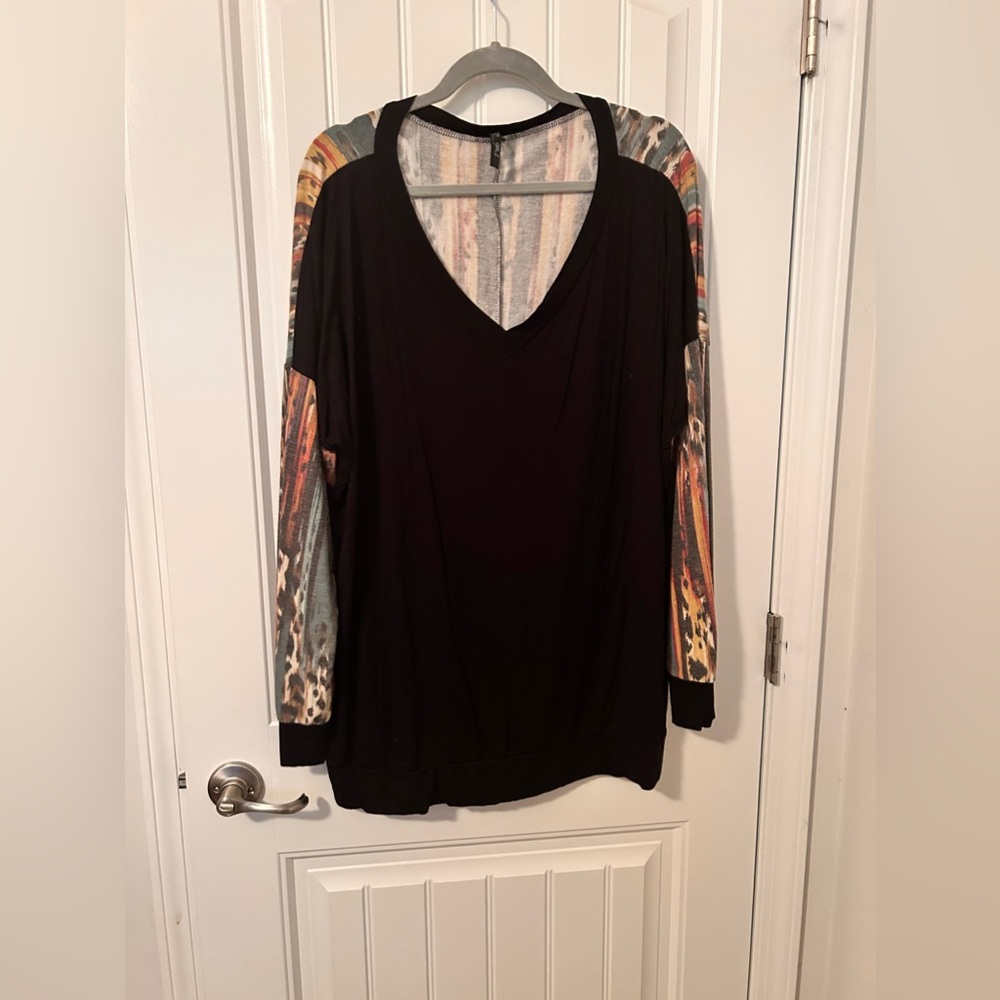 Black long sleeve w/ colors, animal prints on the back and sleeves size 2X